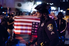 161109-Trump-protest-cop-and-flag-Large