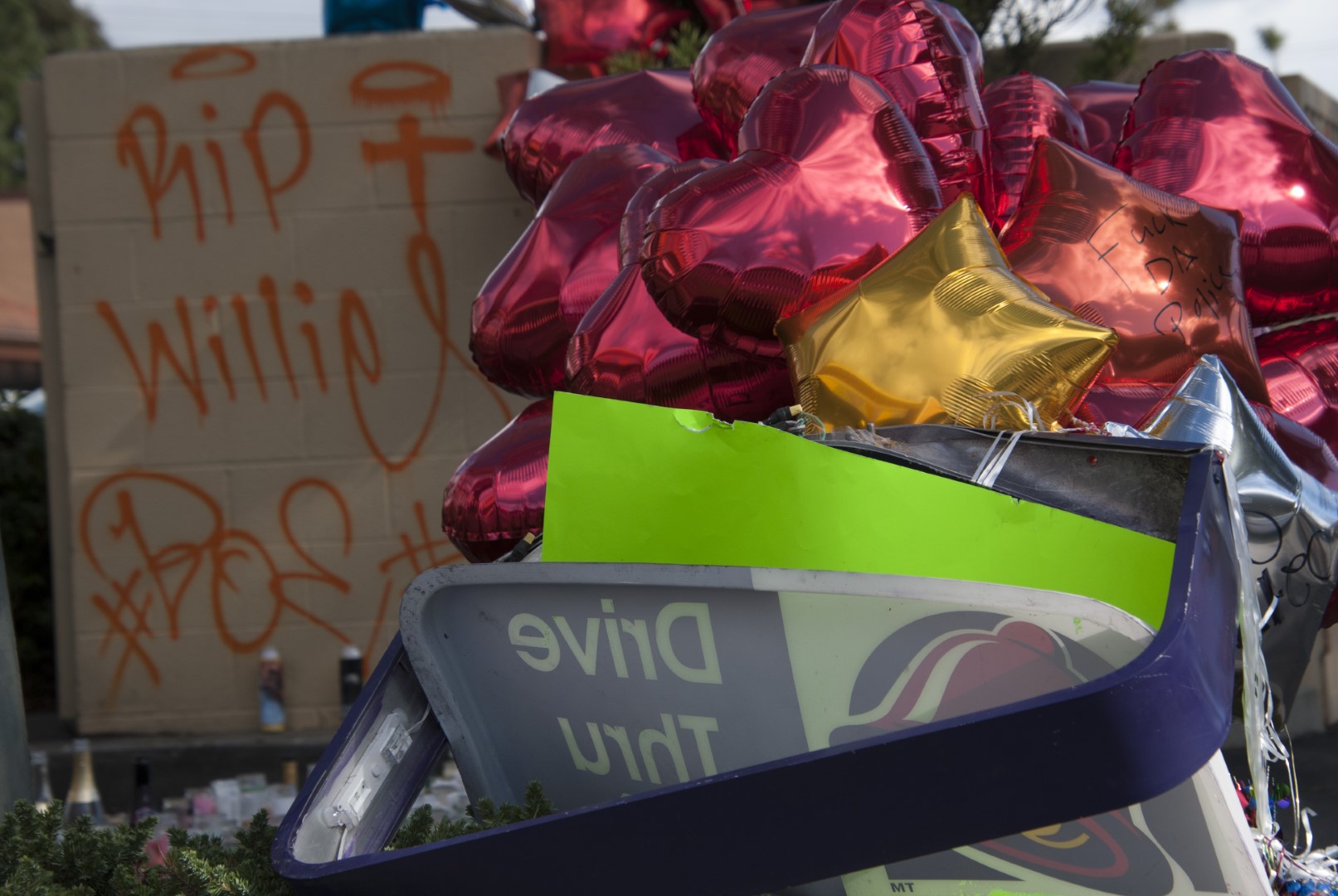 A memorial for Willie McCoy at the Taco Bell drive through where he was shot and killed by Vallejo police officers. Photo by Scott Morris