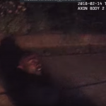 A still from Officer Ryan McMahon's body camera video showing Ronnell Foster on the ground just before McMahon shot him on Feb. 13, 2018.