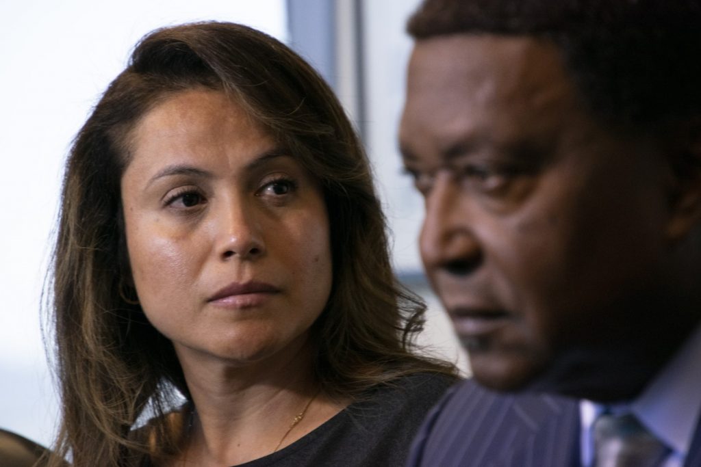 Christian Madrigal's mother, Gabriela Covarrubia, and civil rights attorney John Burris at a news conference announcing a claim filed in Madrigal's death. Photo by Scott Morris.