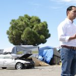 Democratic Presidential Candidate Julián Castro speaks at an Oakland homeless encampment on Sept. 25. Photo by Scott Morris