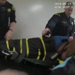 Deputies use a WRAP restraint on Dujuan Armstrong that caused his death in Santa Rita Jail. Alameda County Sheriff's Office video still.