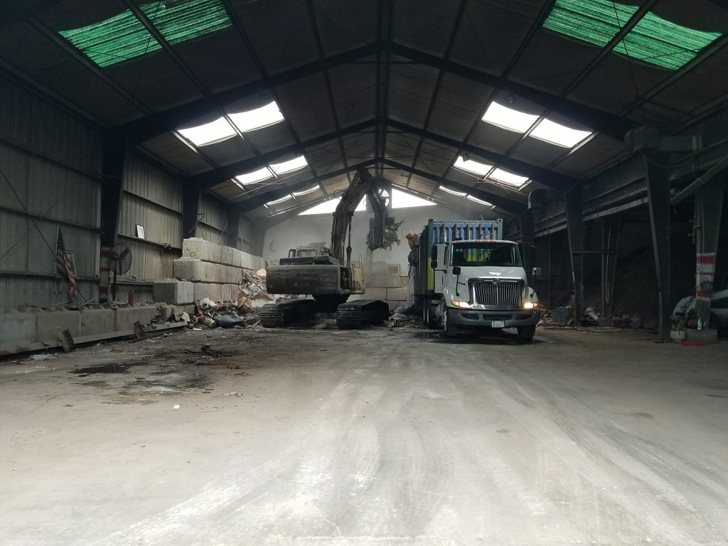 The interior of a Poplar Street warehouse in Oakland where Moacir Dos Santos was operating an illegal transfer station. Photo by Jon Sarriugarte.