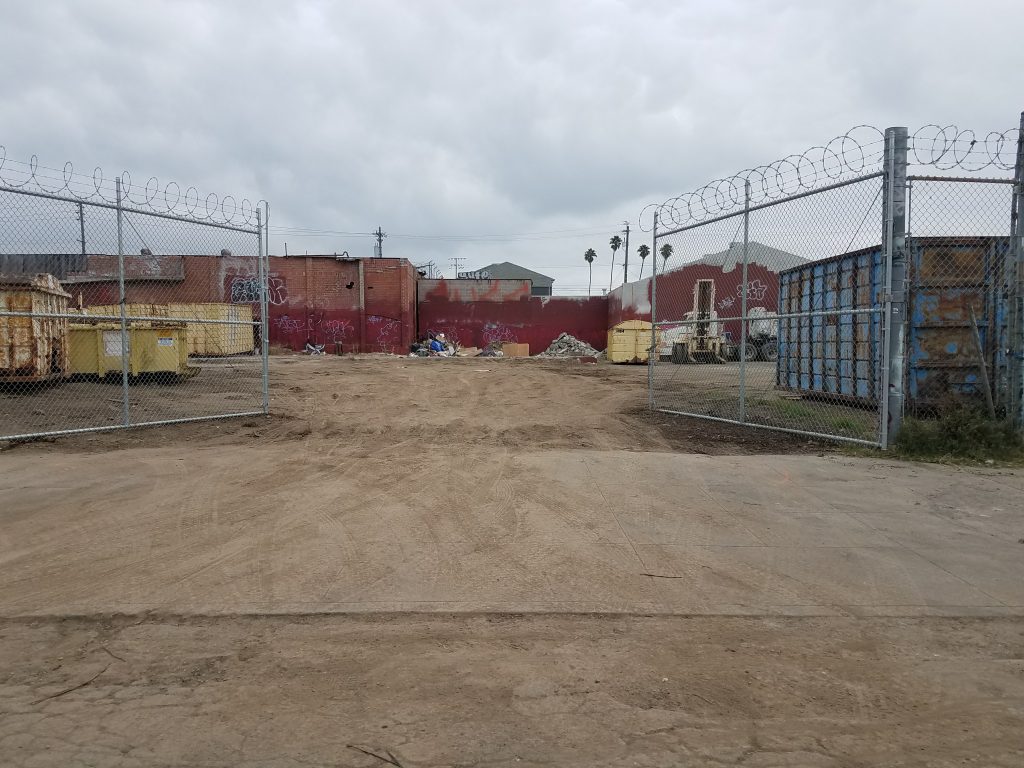 Moacir Gomes Dos Santos started operating in a second West Oakland property in summer 2017: the yard at the former Coast Sausage factory at 28th and Adeline streets. Photo by Jon Sarriugarte.