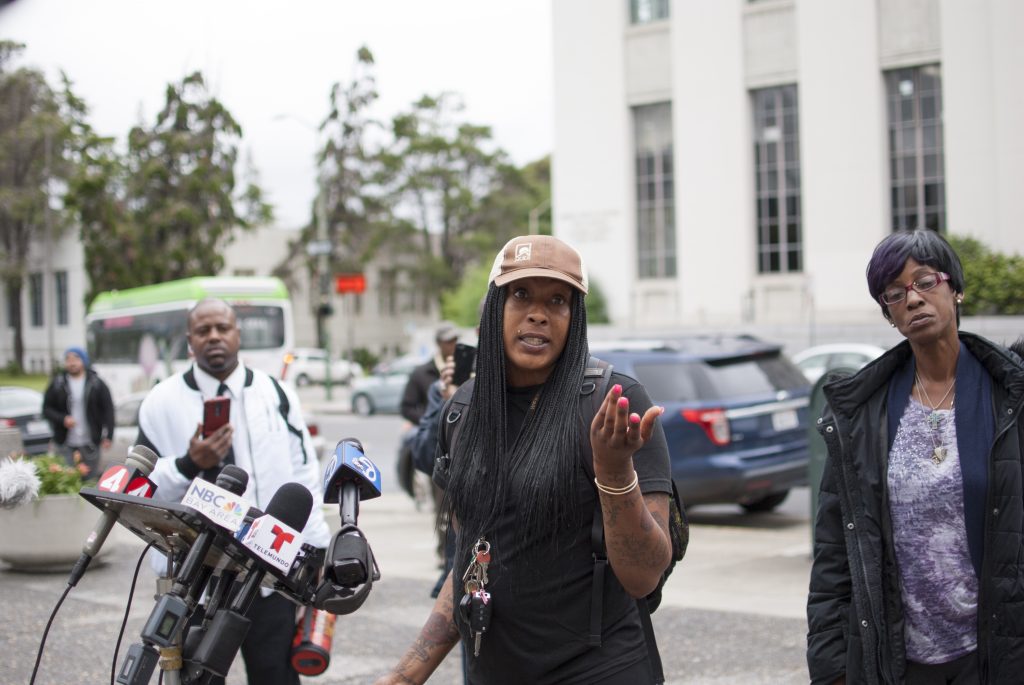 Eliza Anderson, a former tenant at 2551 San Pablo Ave., in Oakland, California, where a fire killed four people in 2017, discusses a lawsuit at a press conference at the Alameda County Administration Building in downtown Oakland on April 26, 2017.