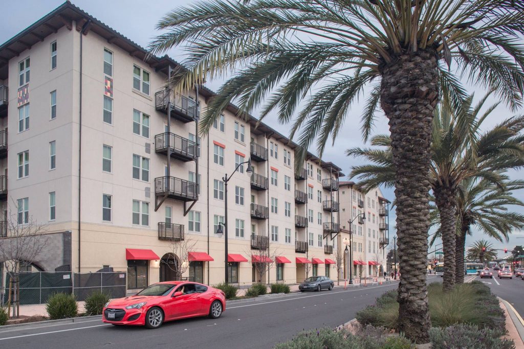 A new 115-unit apartment complex opened at the San Leandro BART station in May 2017. Photo courtesy BRIDGE Housing.