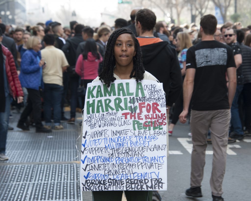 A lone protester outside U.S. Sen. Kamala Harris's first presidential campaign rally at Oakland City Hall on Jan. 27. Harris announced she is running for President of the United States on Jan. 21. 