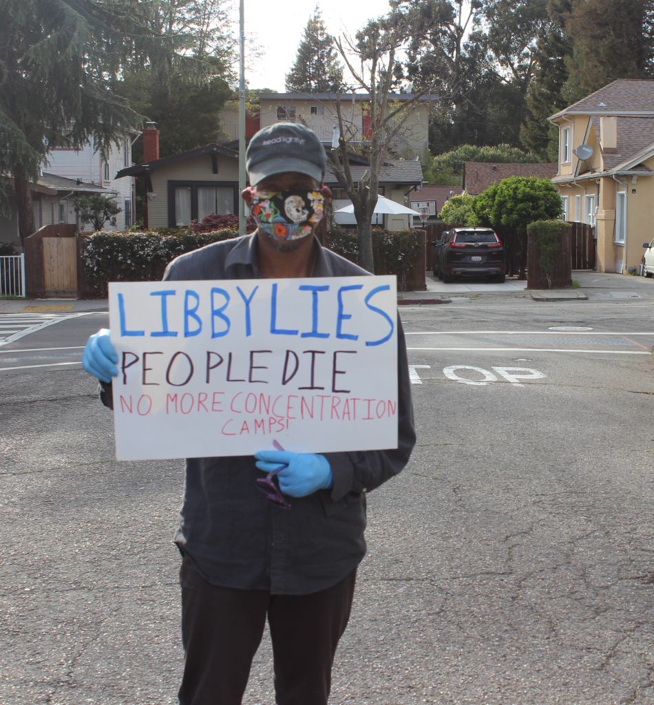 Lamonte Ford, an unhoused person who lives on Wood Street, poses after the protest at Mayor Libby Schaaf's house. Photo by Zack Haber